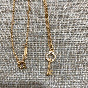 Tiffany & Co. Small Key Pendant Inlaid With Diamonds In Gold Necklace